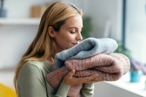 Specialist carefully cleaning a delicate garment.